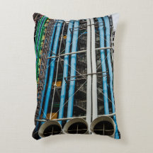 Colored pipelines on the facade of a building