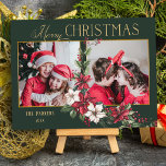 Colorful 2-Photo Merry Christmas Poinsettias Holiday Card<br><div class="desc">Festive and colorful holiday design featuring a two-photo template with custom gold Merry Christmas text graphic with a spray of traditional Christmas poinsettias and holly on a green background.</div>