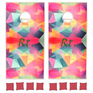 Colorful abstract geometric shapes add letter name cornhole set