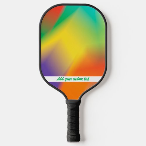 Colorful abstract with blue green pink and orang pickleball paddle
