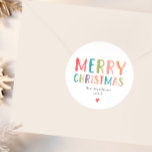Colorful and Bright Merry Christmas Classic Round Sticker<br><div class="desc">This simple and modern family Christmas gift tag sticker features a place for you to add your family name and the year,  alongside ‘Merry Christmas’ in beautiful bright and colorful typography. The perfect minimal addition to your festive Christmas stationery this year.</div>