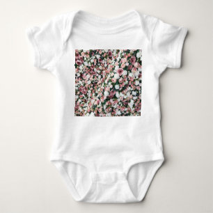 Colorful artificial flowers: vibrant background baby bodysuit