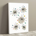 Colorful Atomic Starburst Mid Century Modern Canvas Print<br><div class="desc">This mid-century modern artwork features shooting starbursts in the colors of turquoise,  orange,  tan,  green,  blue,  black and brown. This will make a charming addition to any wall in your home!</div>