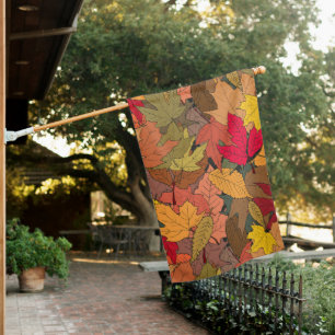 Colorful autumn leaves house flag