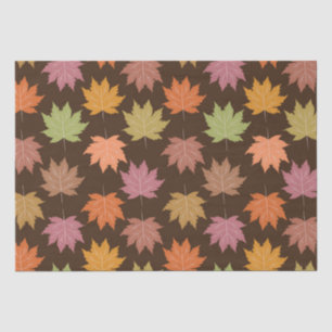 Colorful Autumn Maple leaves on dark brown Tissue Paper