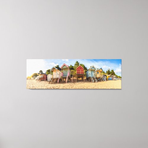 Colorful beach huts sunrise panoramic view canvas print