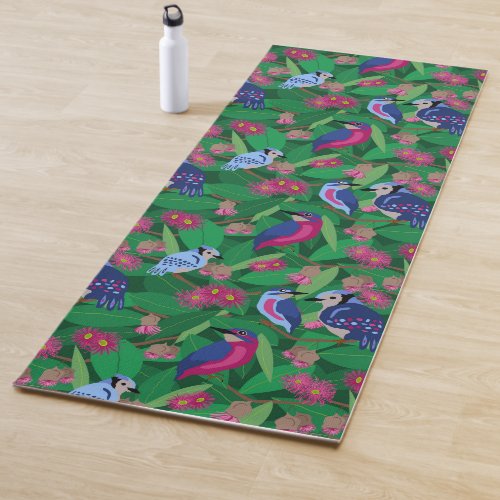 Colorful birds in tree yoga mat