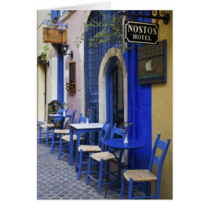 Colorful Blue doorway and siding to old hotel in