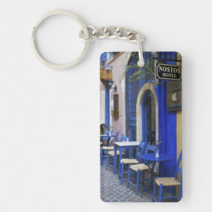 Colorful Blue doorway and siding to old hotel in Keychain