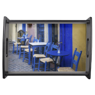 Colorful Blue doorway and siding to old hotel in Serving Tray