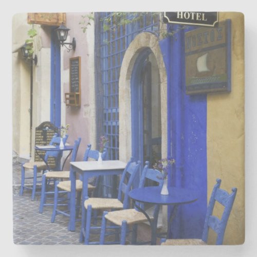 Colorful Blue doorway and siding to old hotel in Stone Coaster