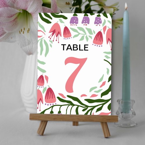 Colorful boho retro branches and flowers wedding table number
