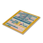 Colorful Brights Painted Geometric Shapes in Teal Ceramic Tile<br><div class="desc">Bring a touch of geometric charm to your space with this colorful ceramic tile featuring a playful triangle pattern in pastel shades, framed by a mustard-yellow border. Perfect as a decorative accent for a kitchen backsplash, bathroom, or as a unique coaster, this tile adds personality and a modern aesthetic to...</div>