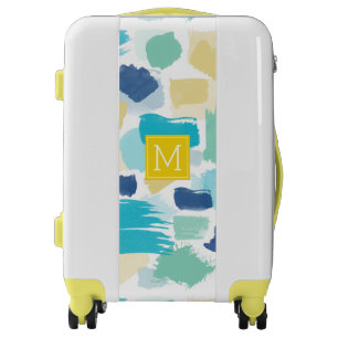 Colorful Brush Strokes and Yellow Monogram Luggage
