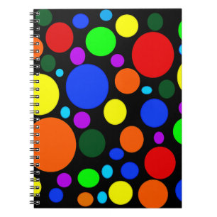 Colorful bubbles on black notebook