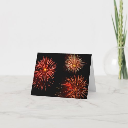 Colorful bursts of fireworks trio against black sk thank you card