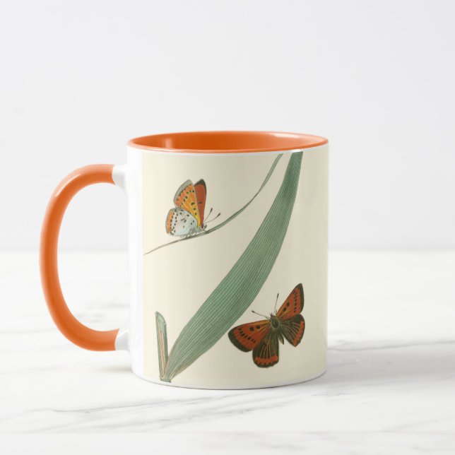 Colorful Butterflies Fluttering Around a Leaf Mug (Left)