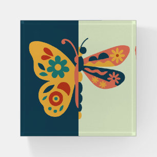 Colorful butterfly decoration with floral elements paperweight