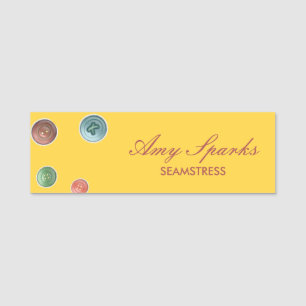 Colorful buttons seamstress yellow name tag