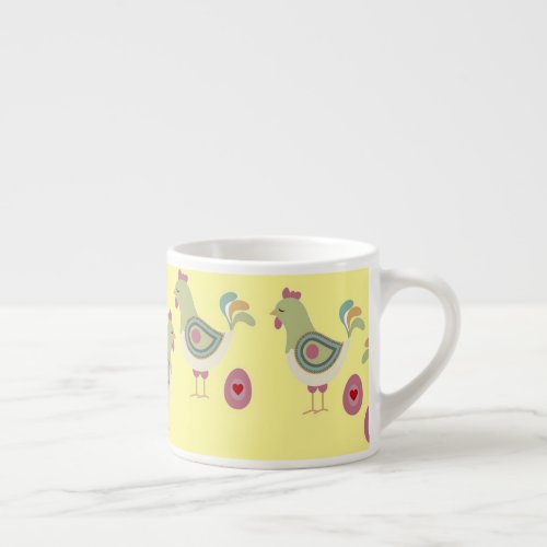 Colorful chicken and egg on yellow espresso cup