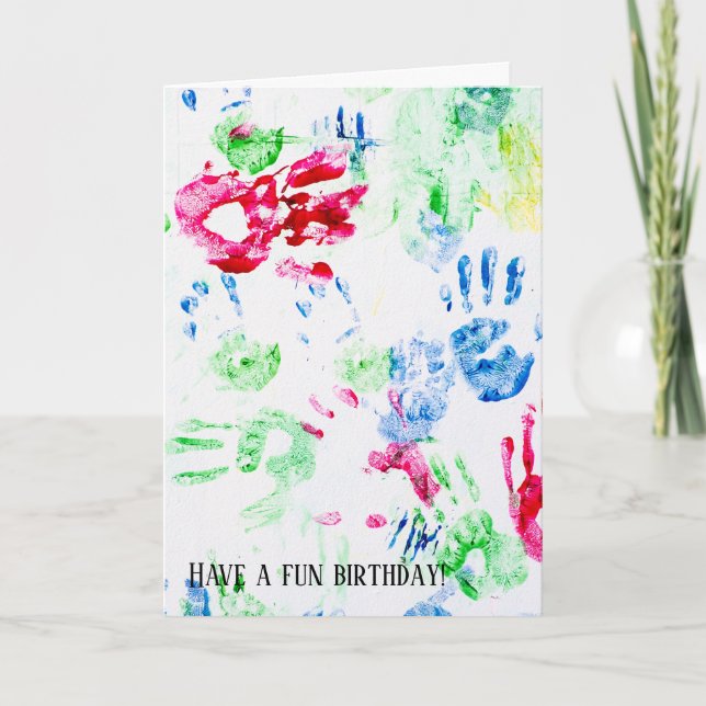 colorful child handprint on white card (Front)