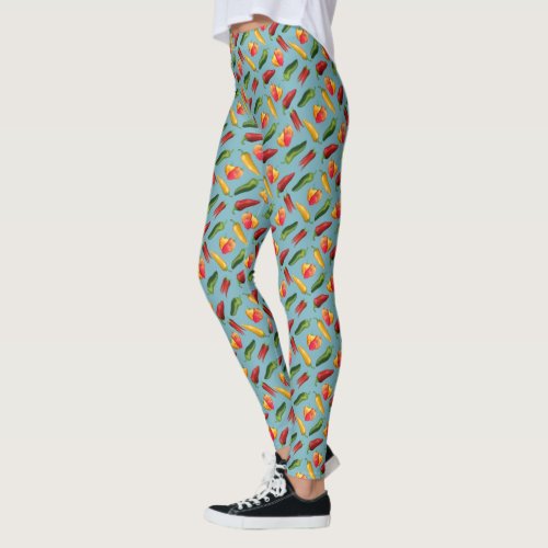 Colorful Chili peppers on blue  Leggings