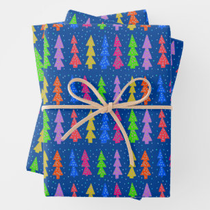 Colorful Christmas Trees on Blue Wrapping Paper Sheets