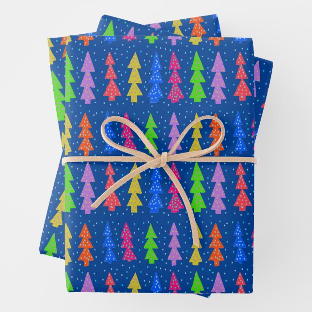 Colorful Christmas Trees on Blue Wrapping Paper Sheets (In situ)