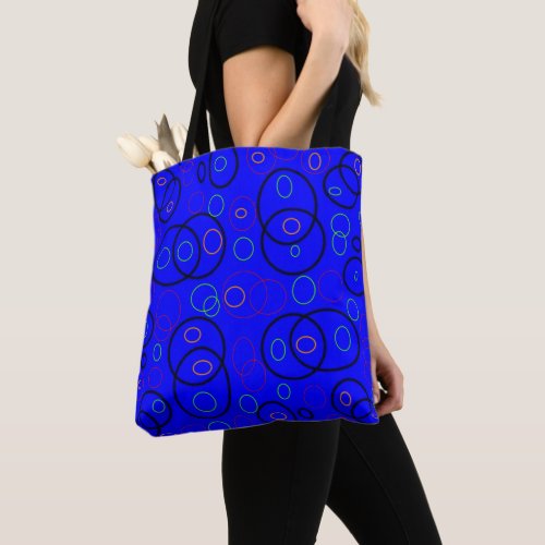 Colorful circles on blue tote bag