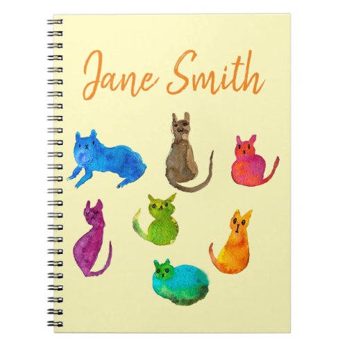 Colorful crazy cats in watercolor notebook