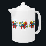 Colorful Decorative Swedish Dala Horses Teapot<br><div class="desc">Swedish Norwegian traditional folk art Dala Horses decorate this teapot in whimsical cheerful red,  blue and yellow. Dala horses are popular during the Christmas holidays in Swedish,  Norwegian and Danish homes. These particular ones are decorated with a hint of rosemaling. Scandinavian gifts for you to enjoy.</div>