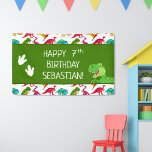 Colorful Dinosaur Pattern T-Rex Birthday Party Banner<br><div class="desc">Does your little boy or girl love dinosaurs? This custom birthday party banner is perfect! There's a big T-Rex, dinosaur footprints and your little kid's name and age on white, the text Happy Birthday, a green background, and a fun colorful dino pattern. This bday sign makes a great personalized addition...</div>