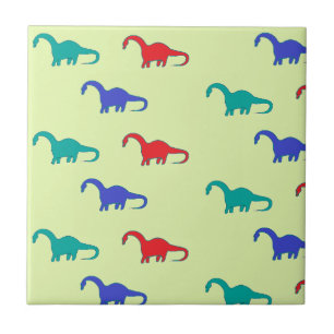 Colorful dinosaurs pattern on green ceramic tile