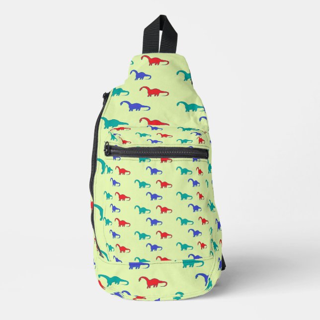 Colorful dinosaurs pattern on green sling bag (Front)