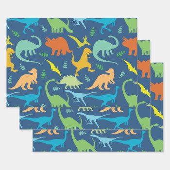 Colorful Dinosaurs Wrapping Paper Sheets by ironydesigns at Zazzle
