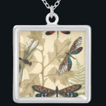 Colorful Dragonflies Floating Above Leaves Silver Plated Necklace<br><div class="desc">Huge dragonflies float above leaves in this piece by Megan Meagher. An alluring depiction of nature. Make sure to place it on your favorite wall!</div>