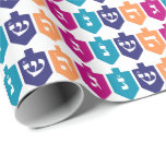 Colorful Dreidels: the Jewish Holiday of Hanukkah Wrapping Paper<br><div class="desc">Cute and cheerful dreidels with the Hebrew letters nun, gimmel, hey, and shin, for the celebrations of the Jewish holiday of Hanukkah. Traditionally, during the holiday of Chanukah, children (and often adults) play a safe-hazard game with a dreidel (or sevivon in modern Hebrew). On the four walls there are the...</div>