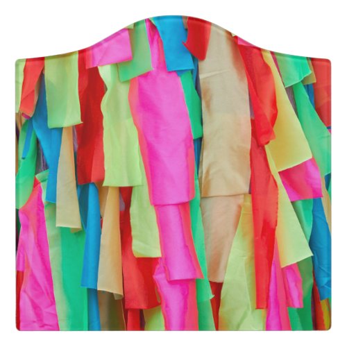 colorful dress at carnival  door sign