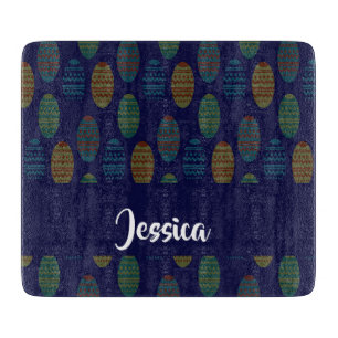Colorful easter eggs on blue cutting board