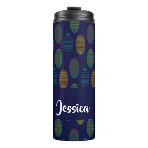 Colorful easter eggs on blue thermal tumbler