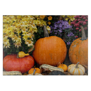 Colorful fall decorative pumpkin display cutting board