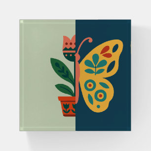 Colorful floral and butterfly split graphic design paperweight
