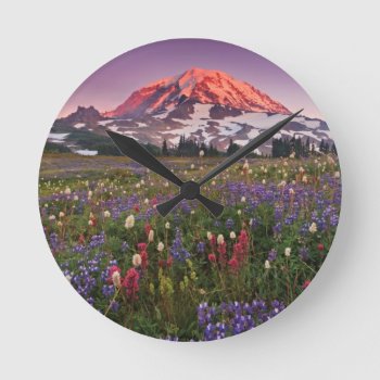 Colorful Flowers In Rainier National Park Round Clock by usmountains at Zazzle