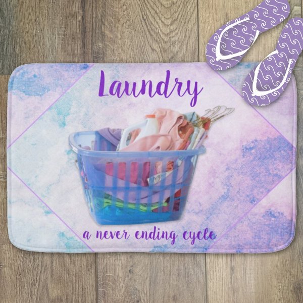 Colorful Folded Laundry On Hangers In Blue Basket