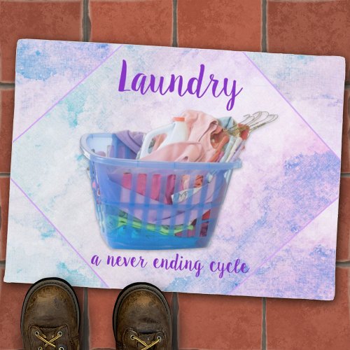 Colorful Folded Laundry On Hangers In Blue Basket  Doormat
