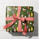 Colorful Folk Art Christmas Tree Ornaments Kids Wrapping Paper<br><div class="desc">This cute, colorful wrapping paper features a pattern of folk-art Christmas ornaments hanging on pine branches. You'll find a nutcracker, star, a rocking horse, glass balls, bells, and more! Great for kids and for kids at heart! *PLEASE NOTE: IF YOU'RE GOING FOR THAT TRADITIONAL CHRISTMAS GIFT WRAP FEEL AND LOOK,...</div>