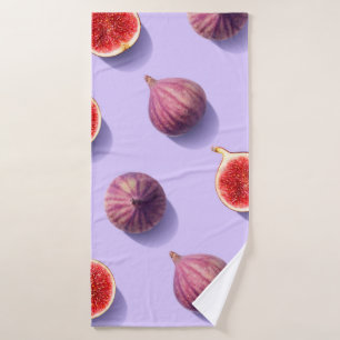 Colorful fruit pattern of fresh figs on purple pas bath towel