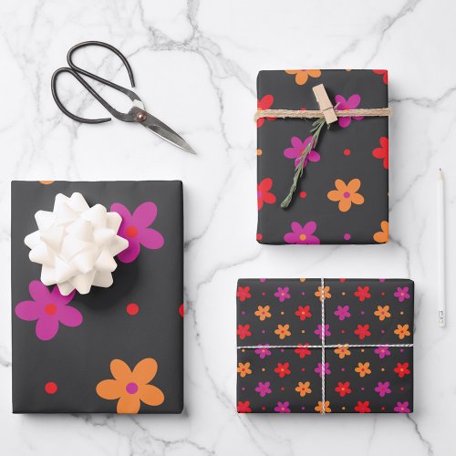 Colorful fun flowers on a dark background wrapping paper sheets