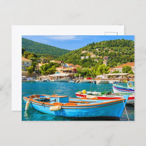 Colorful Greek fishing boats in port of Kioni Postcard