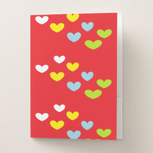 Colorful hearts on red pocket folder